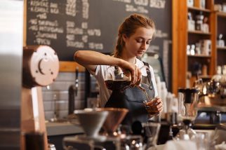 Young zero hours contract worker in a cafe